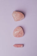 Crystal set featuring Rose Quartz pieces — raw, tumbled and point forms